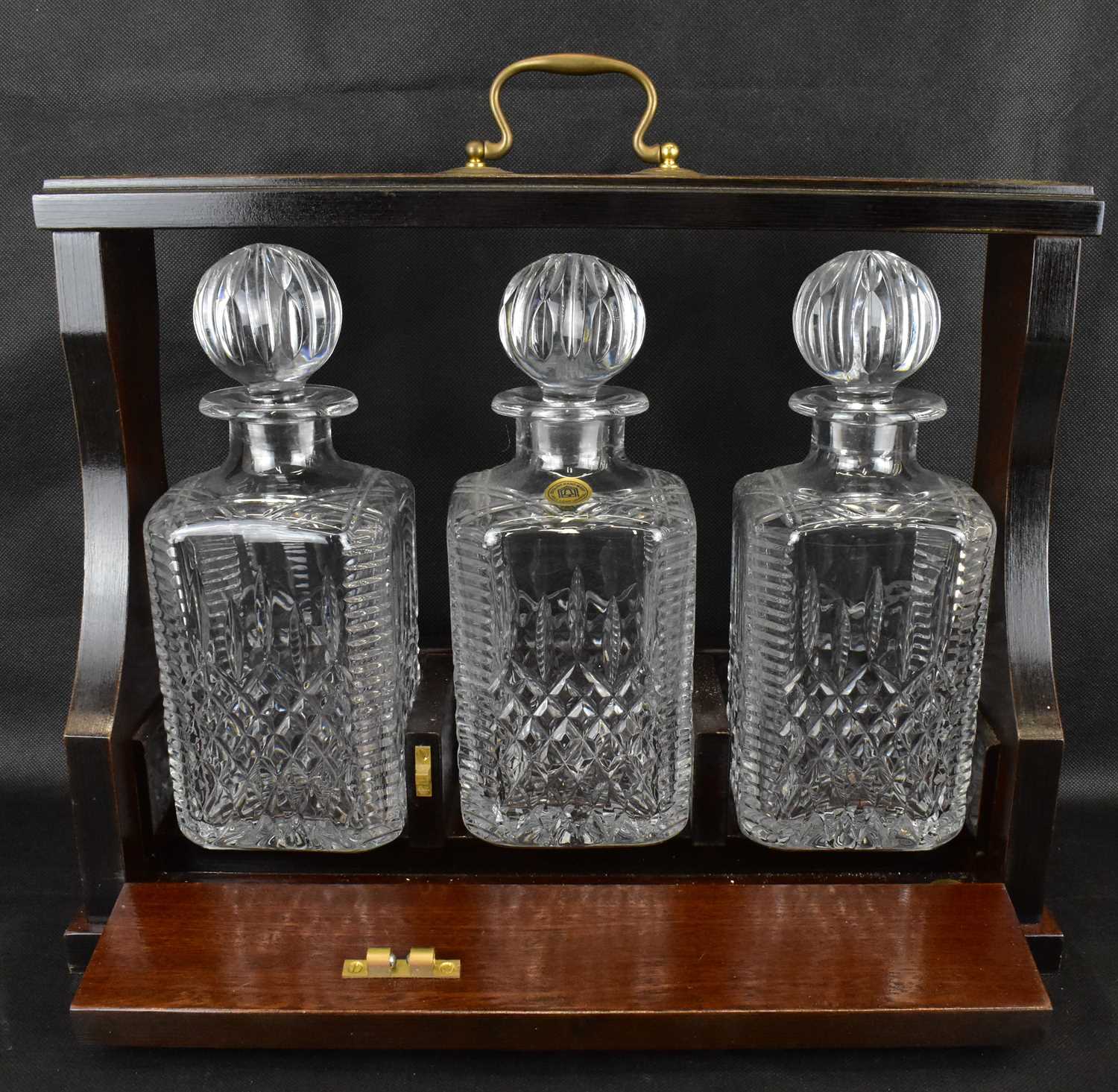 A 20th century mahogany cased three-decanter tantalus, the matching three square English hand made - Image 3 of 4