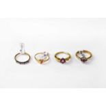 Four 9ct gold rings variously set with rubies and/or diamonds, all hallmarked, combined approx. 9.3g