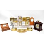 A quantity of modern clocks to include carriage clocks, a Junghans automatic clock, ships' clocks, a