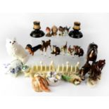 A mixed lot of ceramics to include a Royal Doulton model of a white cat with green eyes, various
