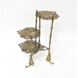 A decorative three-tier brass table with pierced butterfly tiers, 76 x 60 x approx. 30cm.
