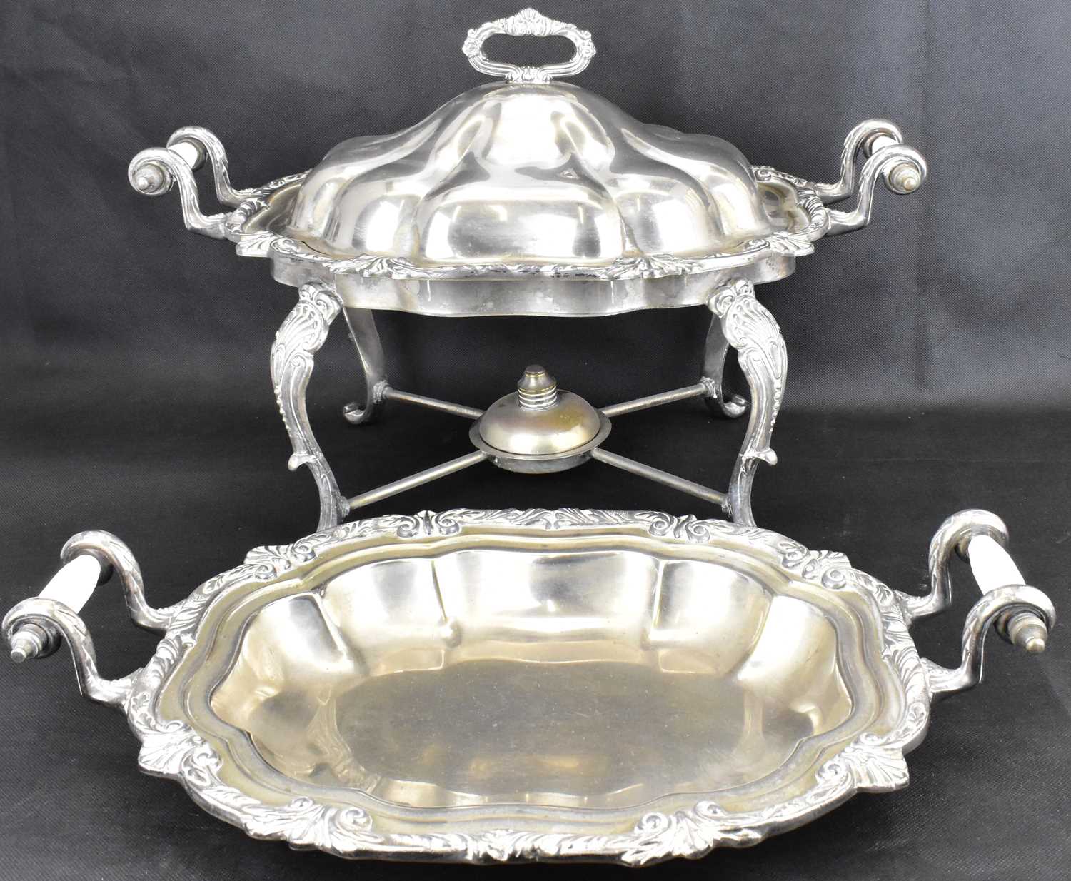 A late 19th/early 20th century silver plated chafing dish with two recessed dishes, with ornate