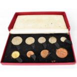 A George VI nine-coin proof set 1950, comprising half crown to farthing, in Royal Mint red Cardboard