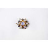 A 9ct gold cluster pendant/brooch set with opals and sapphires, stamped 375, approx. 4.9g.