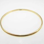 A 9ct gold bangle, internal diameter 6.4cm, approx. 10g.