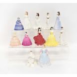 Twelve Coalport and Royal Doulton small figures of ladies, height of largest 14cm, six boxed (12).