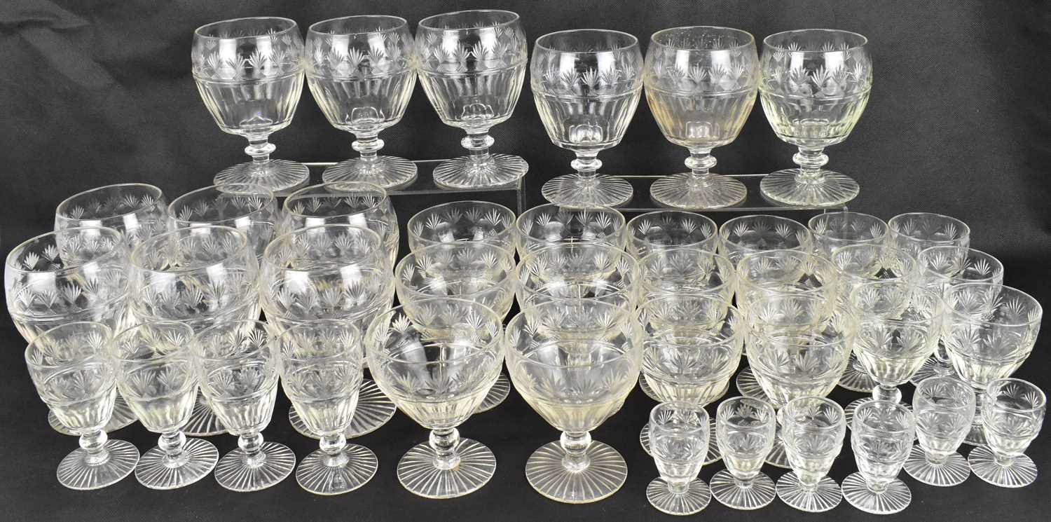 A late 19th/early 20th century forty-piece suite of hand cut glassware, comprising twelve large