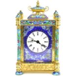 A modern Chinese-style champlevé enamel and brass mantel clock, the white enamelled dial set with