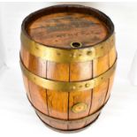 A Burtonwood Brewery Co Ltd coopered wooden barrel with varnished sides and lid, the lid with burned