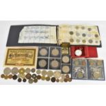 A collectors' lot to include mainly coins, medallions, silver Malaysian dollar, a gold plated fob