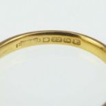 A 22ct gold thin wedding band, size J, approx. 2.3g.