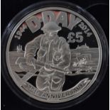 D-DAY 70TH ANNIVERSARY; a Jersey silver £5 coin, encapsulated, with certificate of authenticity,