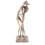 BERNARD KIM (born 1942); a modern bronze sculpture of an elongated couple embracing, on square base,