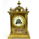 A late 19th/early 20th century French gilt brass enamelled mantel clock, the white enamelled dial