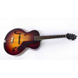 GRETSCH; a New Yorker six-string acoustic guitar.