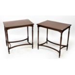 A pair of reproduction mahogany side tables on slender tapering legs, with reeded stretchers, 69 x