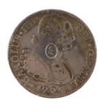 A George III (1760-1820) Bank of England Charles IV eight reales silver coin, countermarked with the