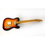 A handmade Telecaster-style electric guitar.