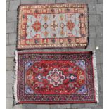 Two small Middle Eastern rugs, both 93 x 62cm (2).