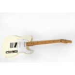 FENDER; a Telecaster electric guitar, made in Mexico.