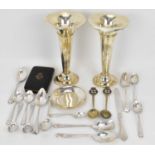 Various silver plated items to include a pair of trumpet vases, trinket dish and mixed spoons,