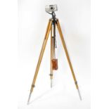 An Olympus Superzoom 100G camera on a wooden and metal tripod, with a Weston Master lightmeter (3).