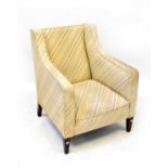 A 1930s armchair upholstered in a striped material, to square tapering legs, height 86cm.