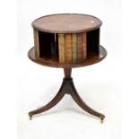 A 19th century mahogany drum-form revolving bookcase with integral faux leather books, height