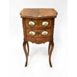 A reproduction burr walnut and satinwood bow-front bedside chest of two drawers with Limoges-style