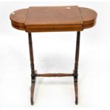 An Edwardian lozenge-shaped mahogany sewing table with three-section lift-up fitted top, 76 x 65 x