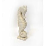 A large modern reconstituted marble sculpture of a seahorse, on square base, unsigned, height