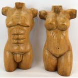 Two carved wooden torsos, male and female, unsigned, height of each approx. 41cm (2).