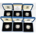 ROYAL MINT; six silver proof £1 coins, dates 1986 to 1990 and 2001, each encapsulated, in