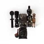 A large carved African female head, height 30cm, and a quantity of African carved figures to include
