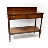 An Edwardian crossbanded mahogany two-tier buffet sideboard with two drawers, on reeded and square