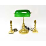 A brass and green glass shade desk lamp and a pair of brass table lamps, height 20cm (3).