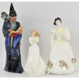 ROYAL DOULTON; three porcelain figures comprising HN2877 'The Wizard', HN3166 'Figure of the Month