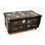 A small two-drawer unit on castors, painted with pansies by Olive Hamley Fraser, signed and dated