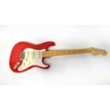 FENDER; a Stratocaster electric guitar with customised red body.Condition Report: Serial no.