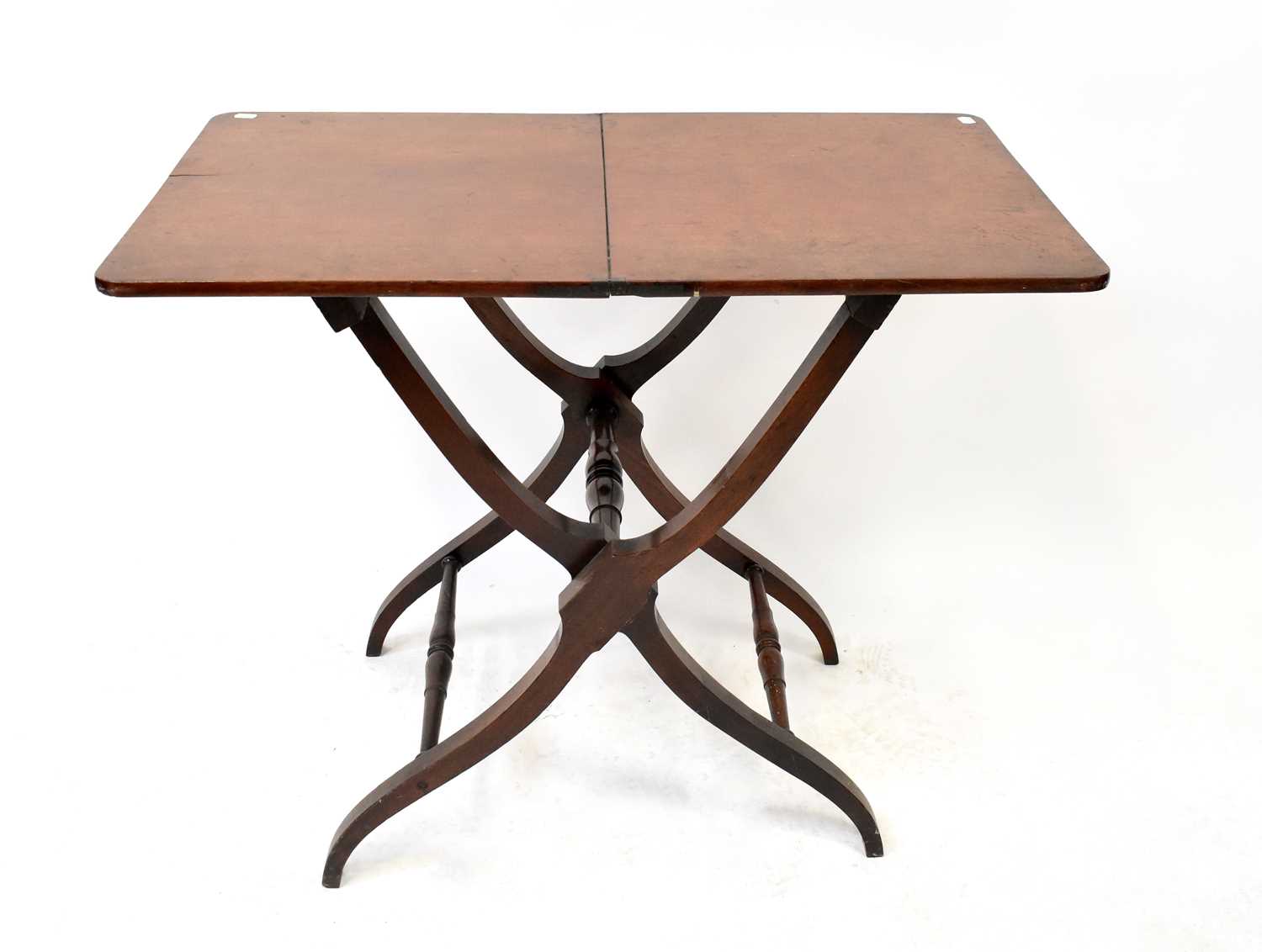 A 19th century mahogany folding campaign table on X-framed supports, 75 x 91.5 x 53.5cm.