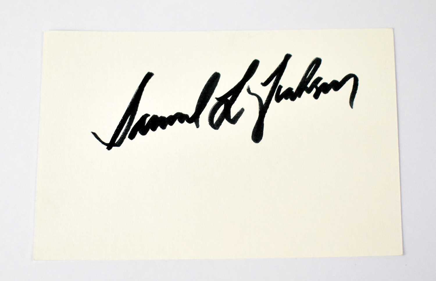 SAMUEL L JACKSON; a card bearing the actor's signature.Condition Report: We have not authenticated