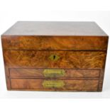 A late 19th/early 20th century burr walnut veneered campaign stationery box, lid with screwed border