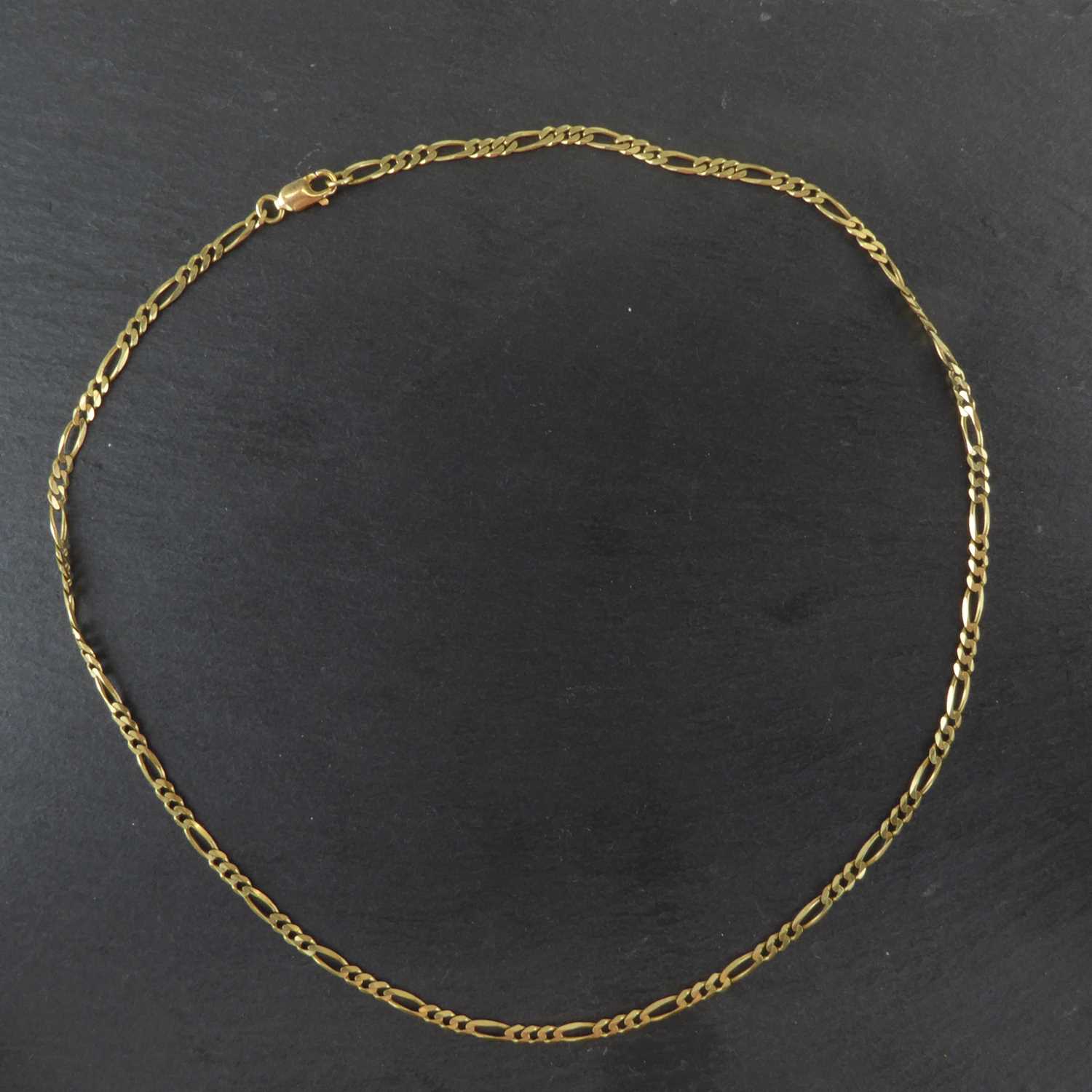 A 9ct gold figaro link necklace, length 42cm, approx. 5.4g.