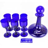 BRISTOL BLUE GLASS; a mid-20th century ship's decanter with ball stopper, height 29cm, and six