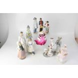 Eleven ceramic figures to include a Nao Dutch girl, a Nao figure of a young Edwardian girl with