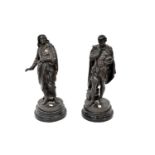 Two late 19th/early 20th century bronzed spelter figures, Shakespeare and Milton, each to circular