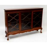 An early 20th century mahogany bookcase, double astragal glazed doors with shelf to interior,