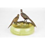 An early 20th century Art Deco onyx circular dish with cold painted bronze pheasant and grouse,