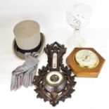 Two wall mounted barometers, one Black Forest style, unmarked with thermometer, length 46cm,