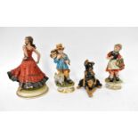 CAPODIMONTE; three figures comprising a flamenco dancer, a boy with a goat and a girl carrying a